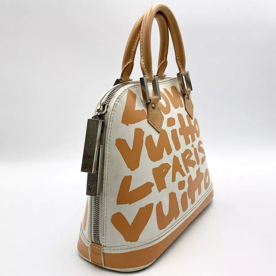 LOUIS VUITTON Alma MM Monogram Graffiti Hand Bag In Beige