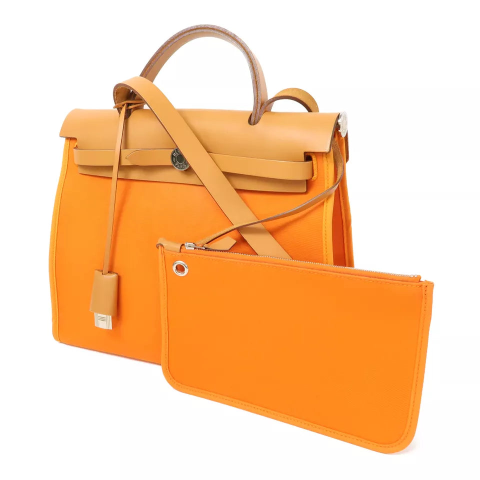 HERMES PHW Herbag PM is a versatile 2-way shoulder bag and handbag