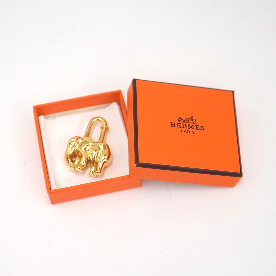 Hermès Elephant Motif Cadena Lock Bag Charm in Gold