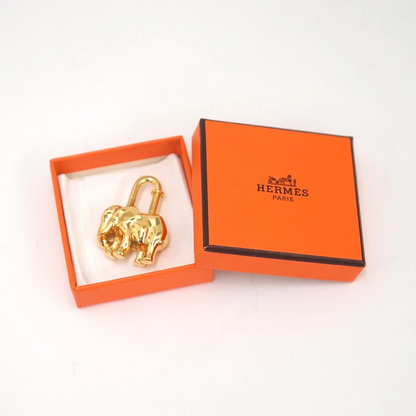Hermès Elephant Motif Cadena Lock Bag Charm in Gold