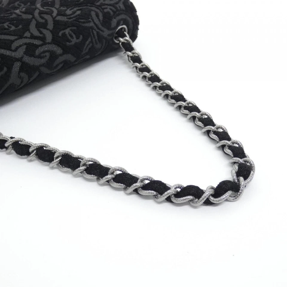 CHANEL CC Patterned Jacquard Flap Handbag