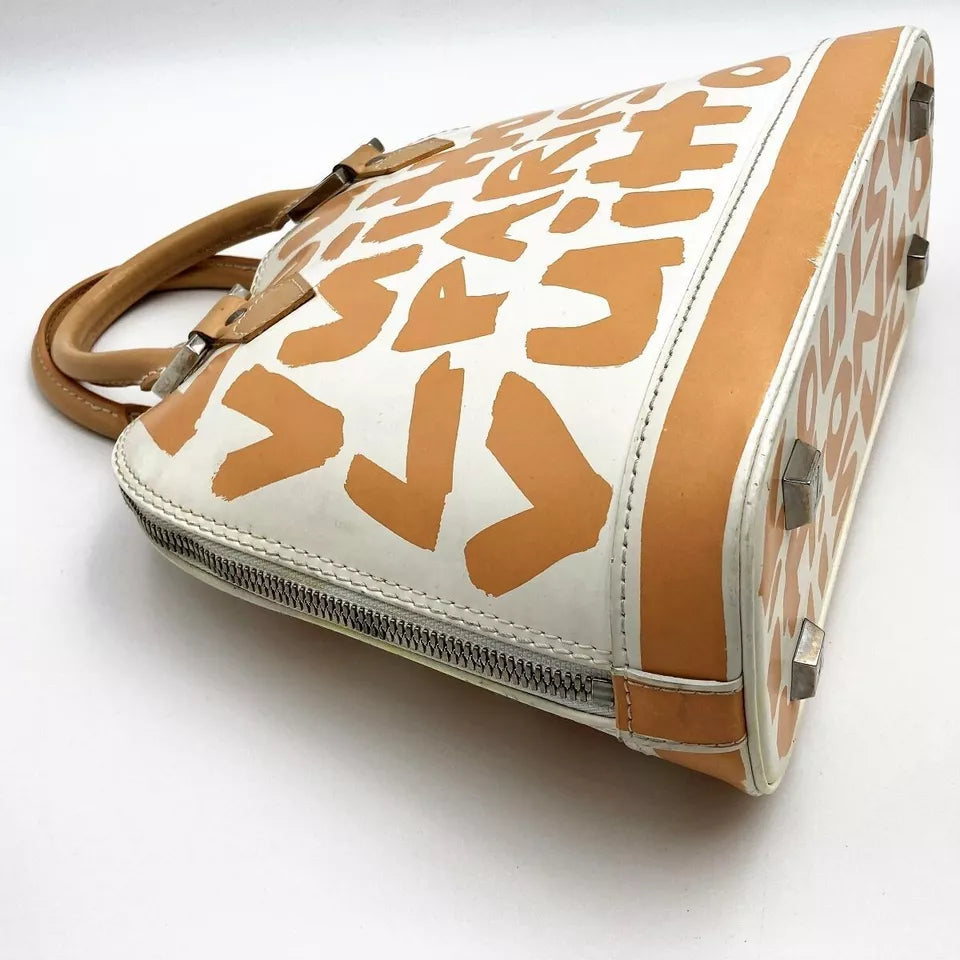 LOUIS VUITTON Alma MM Monogram Graffiti Hand Bag In Beige