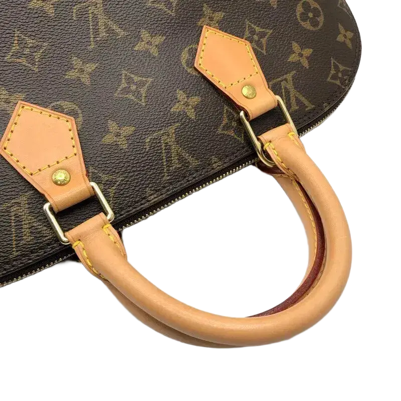 LOUIS VUITTON Alma Handbag