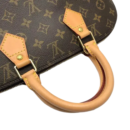 LOUIS VUITTON Alma Handbag
