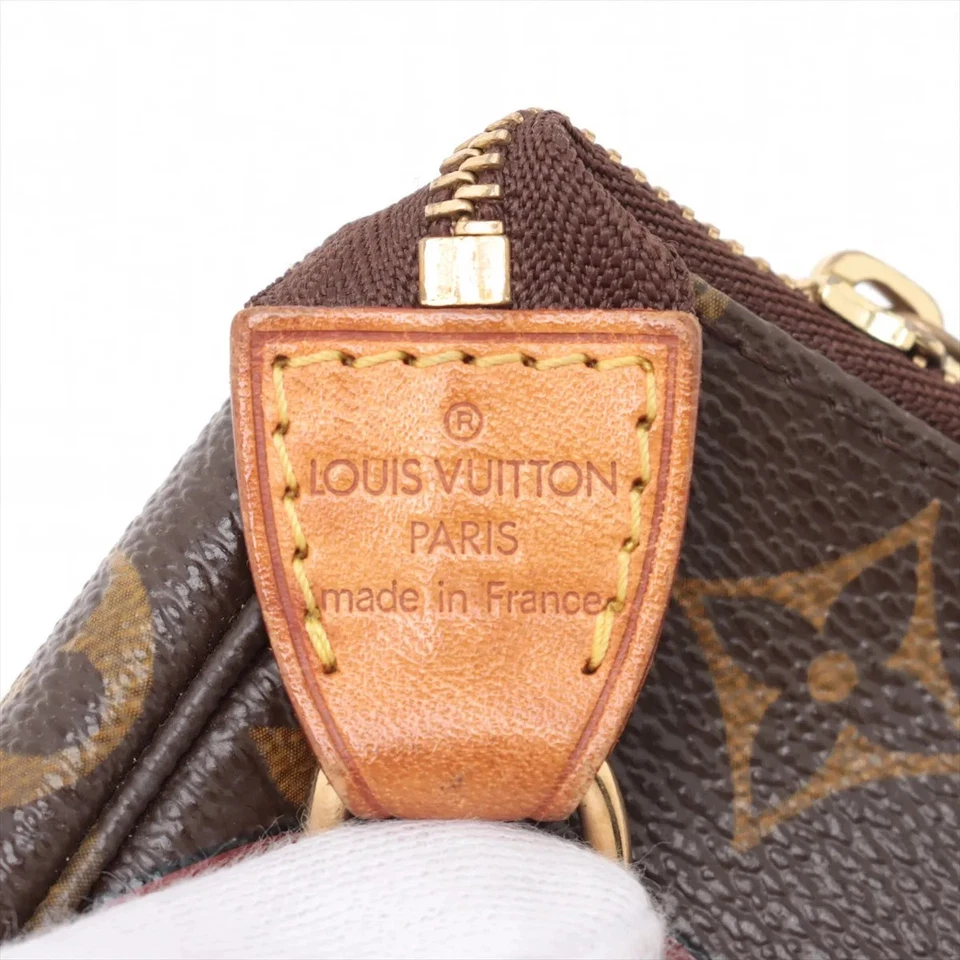 Louis Vuitton Monogram Mini Pochette Accessory Brown
