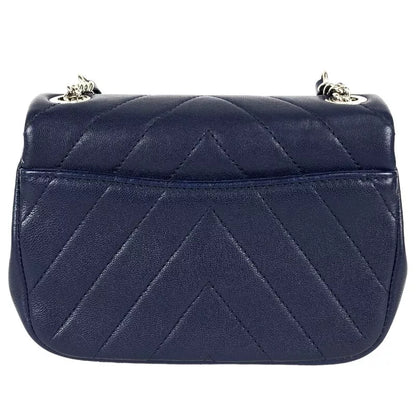 CHANEL Mini Chevron Shoulder Bag In Navy Lambskin with Silver Hardware