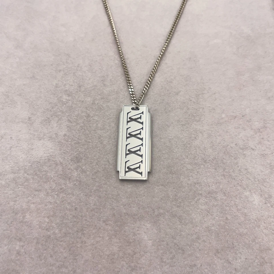 Louis Vuitton Collier Plaque Multi LV Necklace in Silver