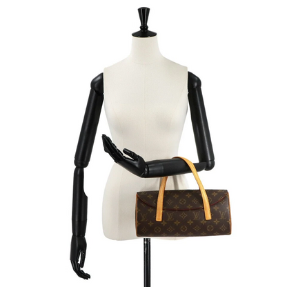 Louis Vuitton Sonatine Handbag in Monogram Canvas
