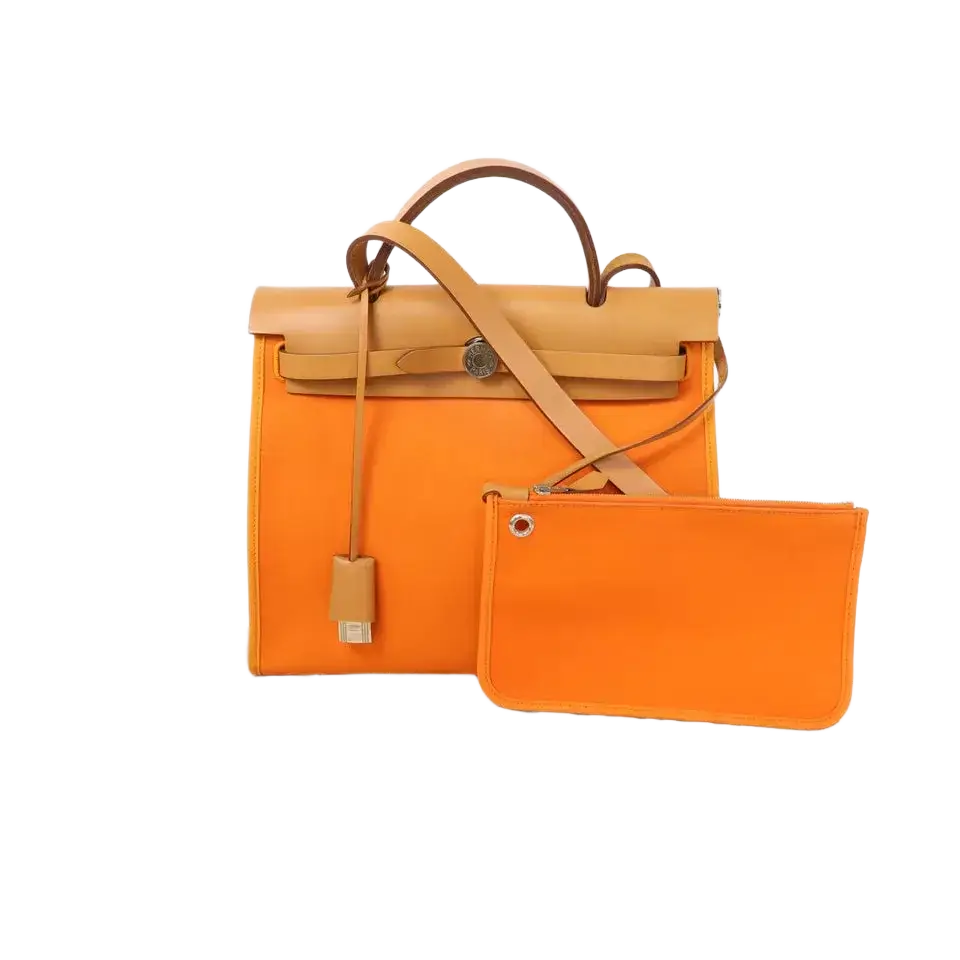 HERMES PHW Herbag PM is a versatile 2-way shoulder bag and handbag