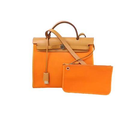 HERMES PHW Herbag PM is a versatile 2-way shoulder bag and handbag