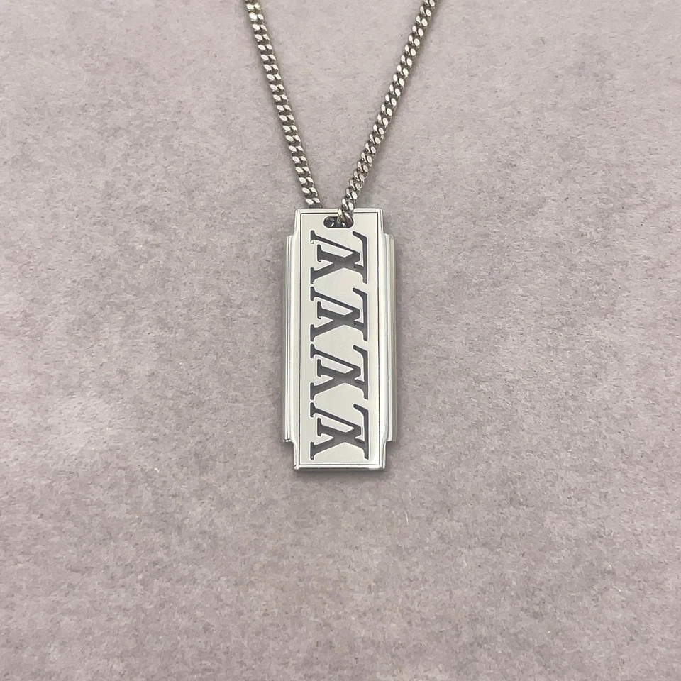 Louis Vuitton Collier Plaque Multi LV Necklace in Silver