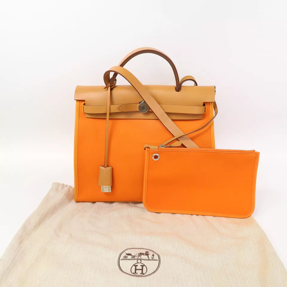 HERMES PHW Herbag PM is a versatile 2-way shoulder bag and handbag