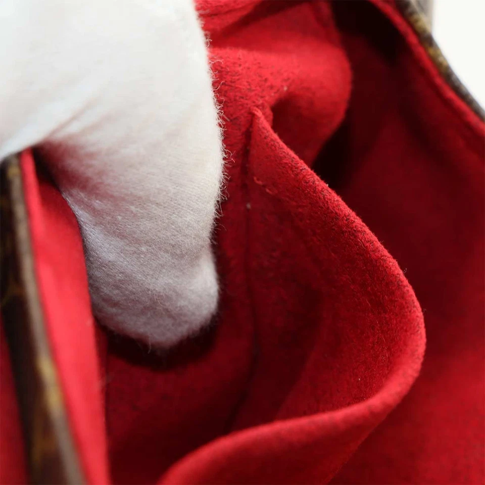 Louis Vuitton Sonatine Handbag in Monogram Canvas