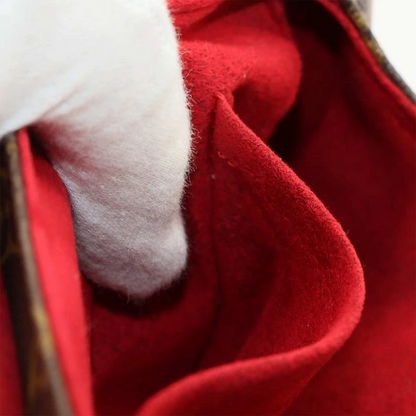 Louis Vuitton Sonatine Handbag in Monogram Canvas