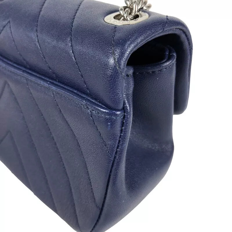 CHANEL Mini Chevron Shoulder Bag In Navy Lambskin with Silver Hardware