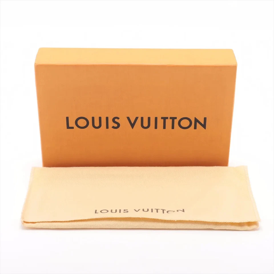 Louis Vuitton Monogram Mini Pochette Accessory Brown