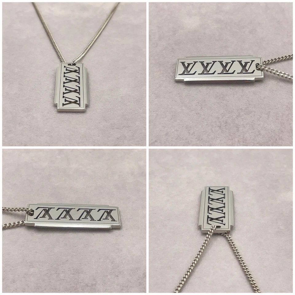 Louis Vuitton Collier Plaque Multi LV Necklace in Silver